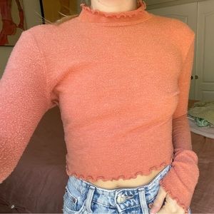 Rosy turtleneck